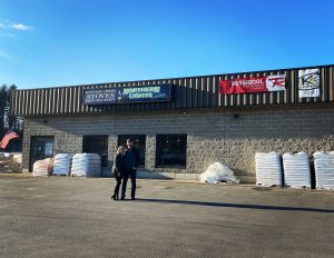 Josh and Alicia in front of their Northern Lights Store