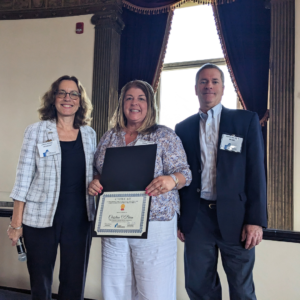 Christina O’Brien, Certified Business Advisor standing with State Director Linda Rossi and Maine SBDC State Director Mark Delisle and Vermont SBDC at NEPD 2023.