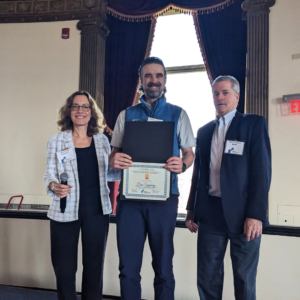 Dan Umphrey, Certified Business Advisor standing with State Director Linda Rossi and Maine SBDC State Director Mark Delisle and Vermont SBDC at NEPD 2023.