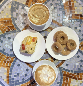 Delicious treats and beverages on a mosaic tabletop at Sip House in Freeport
